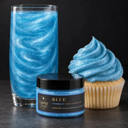 Blue edible luster dust in a 50 g jar beside a blue glitter drink and a cupcake coated in blue edible glitter