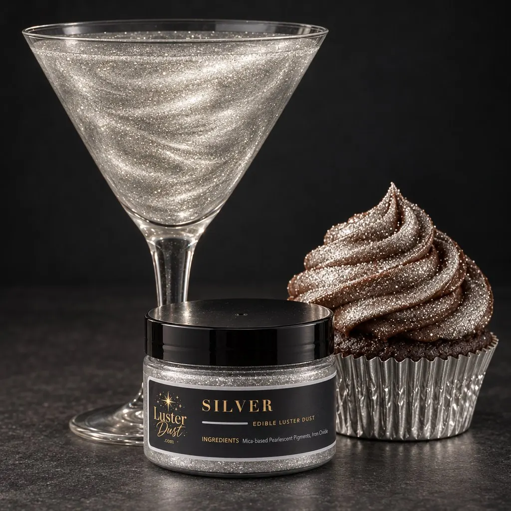 Silver edible luster dust in a 50 g jar beside a silver glitter drink and a cupcake coated in silver edible glitter