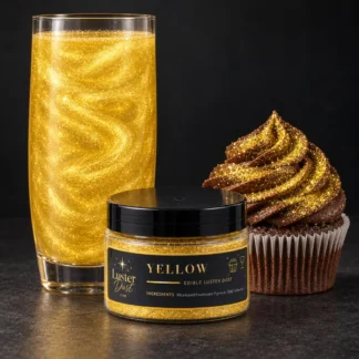 Yellow edible luster dust in a 50 g jar beside a yellow glitter drink and a cupcake coated in yellow edible glitter
